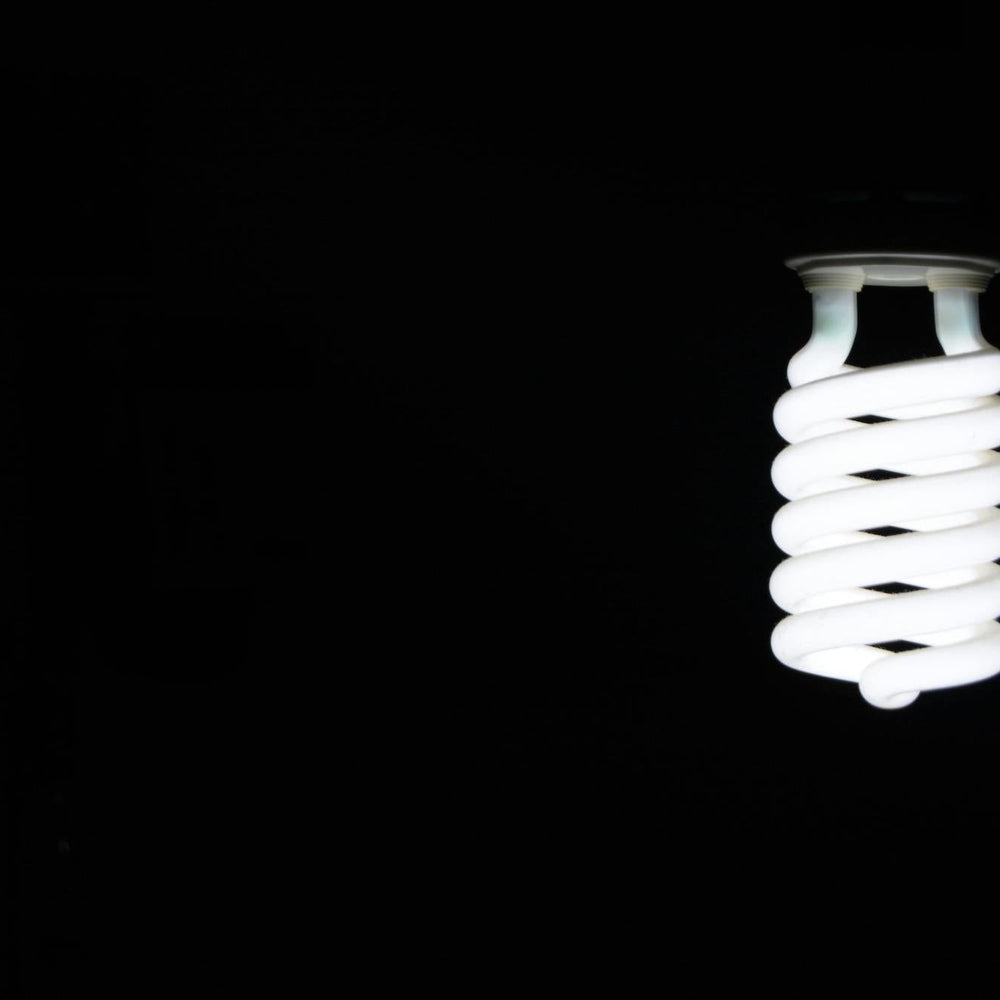 led light bulb on black background