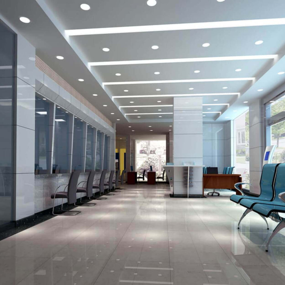 lobby waiting area with a multitude of white led light bulbs in the ceiling